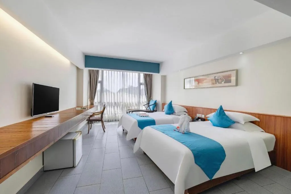 Bed in Sanya Luyi Sea View Hotel