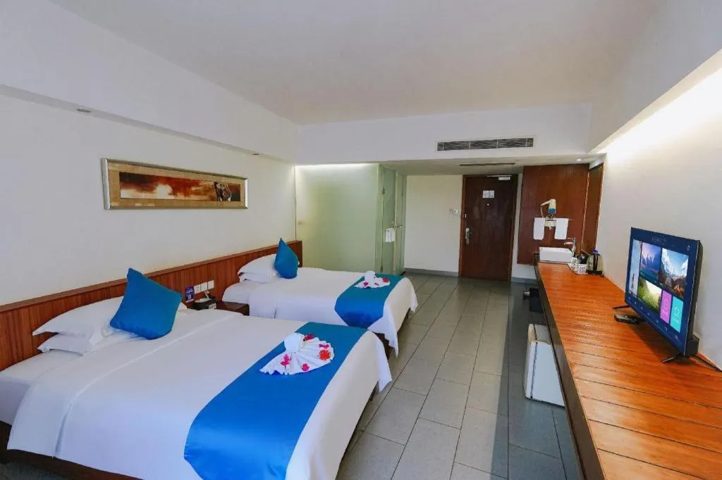 Bed in Sanya Luyi Sea View Hotel