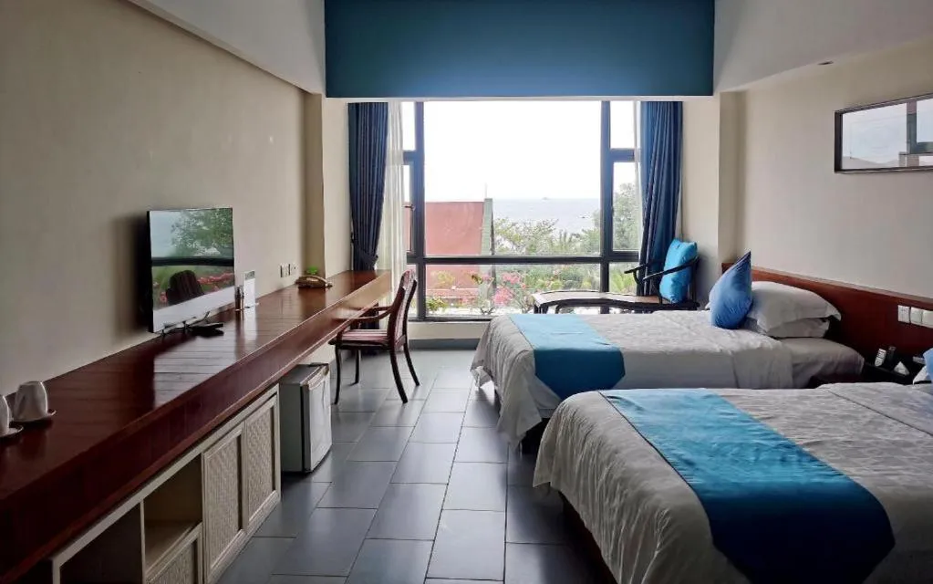 Bed in Sanya Luyi Sea View Hotel