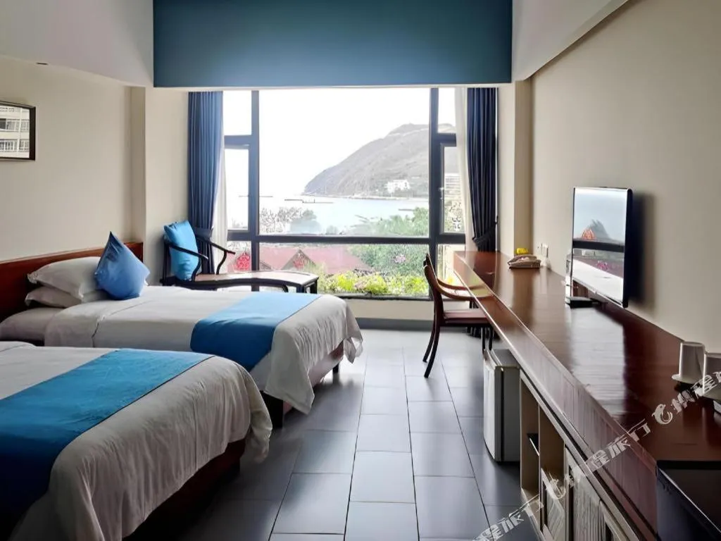 Bed in Sanya Luyi Sea View Hotel