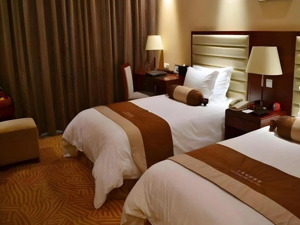 Bed in Paradise Jinjiang Hotel