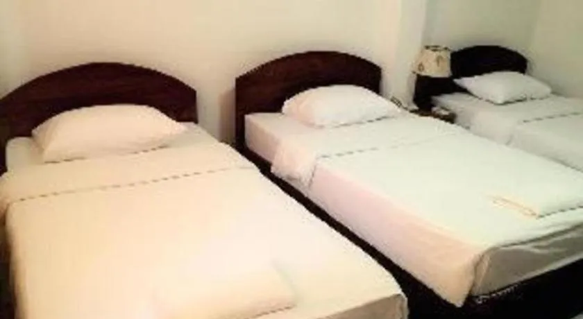 Bed in Saysamphanh Hotel