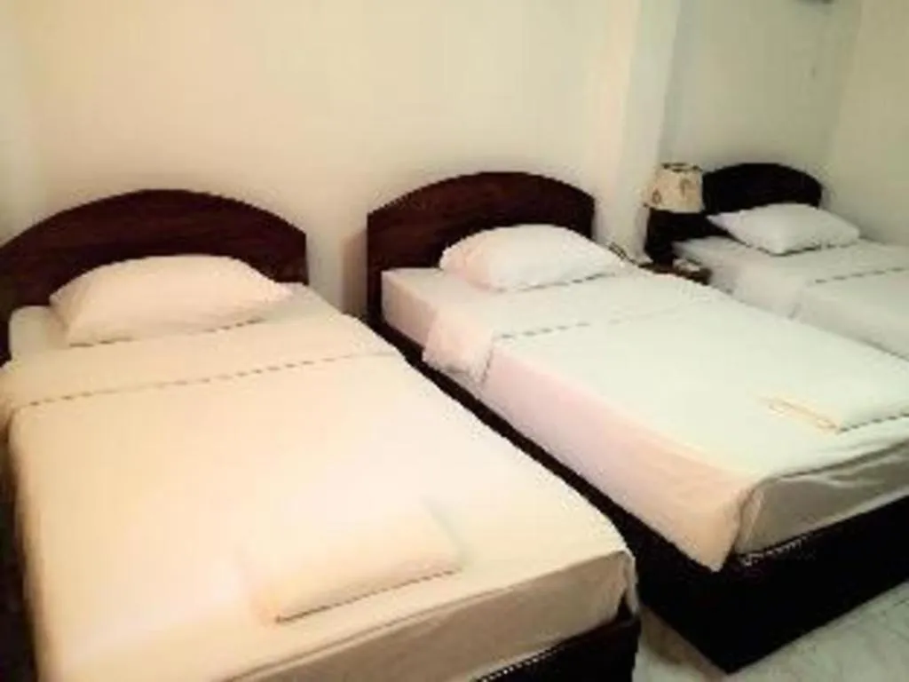 Bed in Saysamphanh Hotel