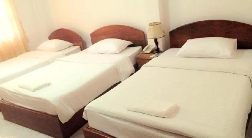 Bed in Saysamphanh Hotel