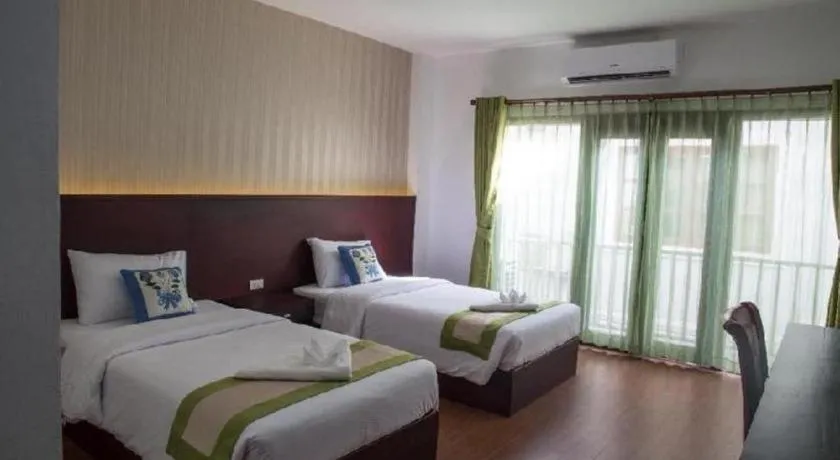 Bed in Saysamphanh Hotel