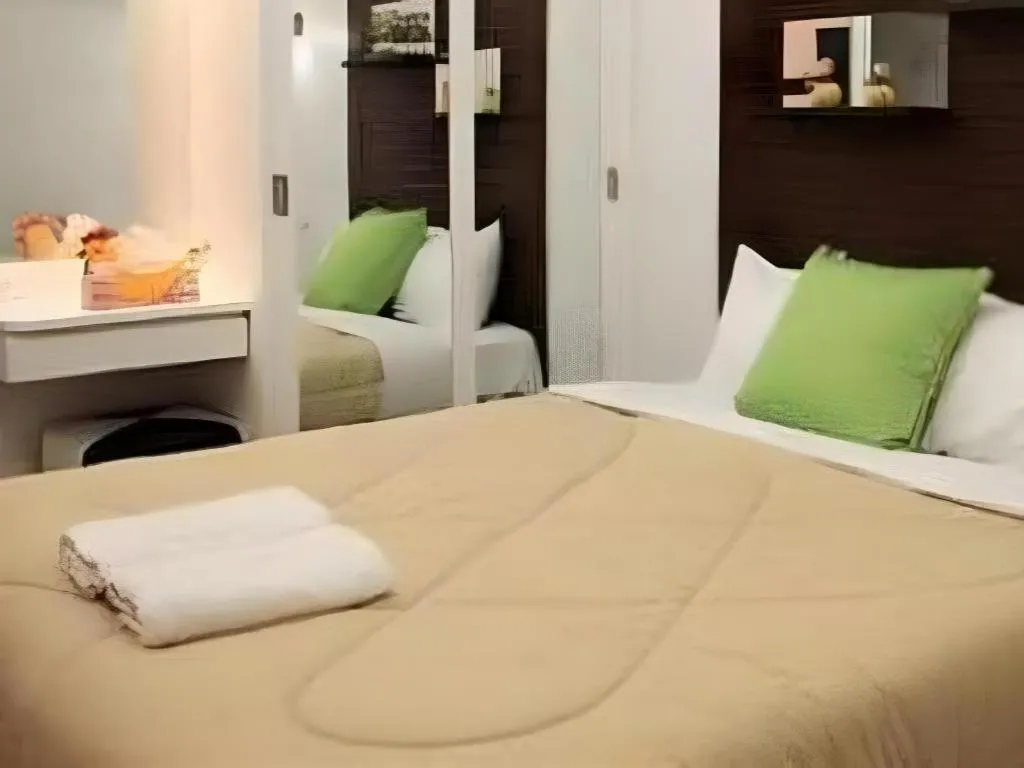 Bed in Huay Kaew Palace 1 Hotel