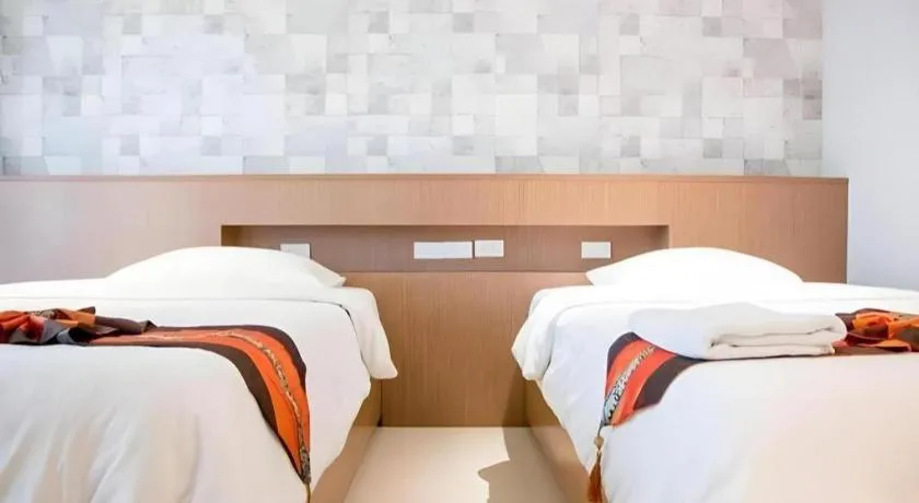 Bed in Huay Kaew Palace 1 Hotel