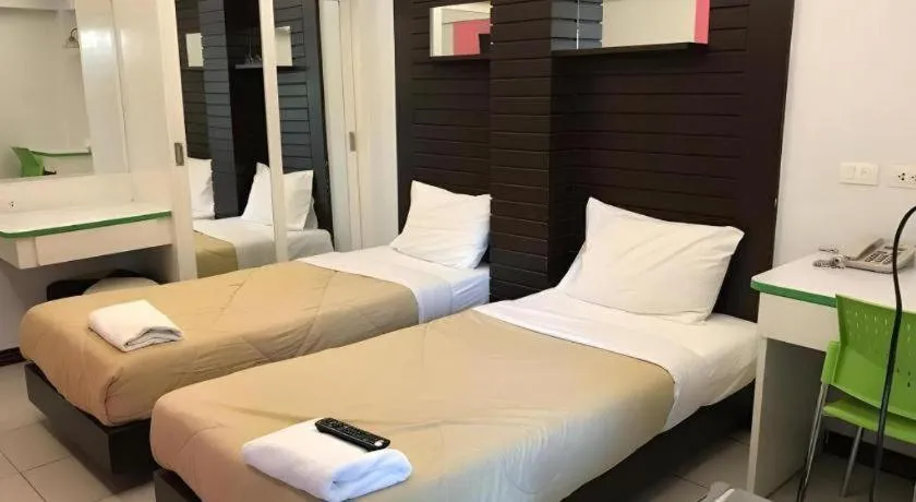 Bed in Huay Kaew Palace 1 Hotel