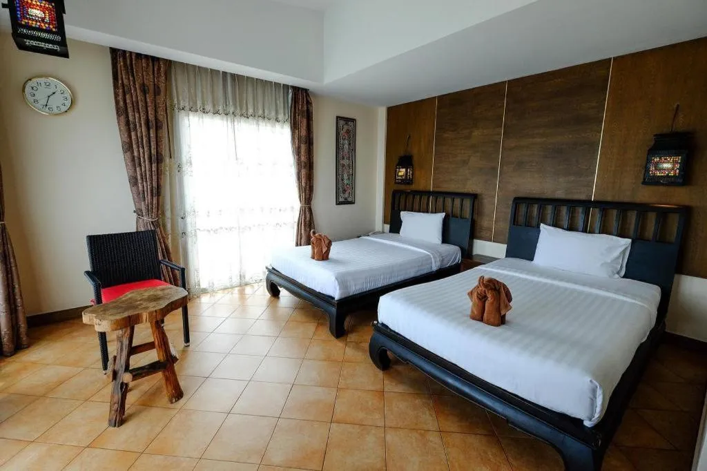 Bed in Red Balcony Hotel