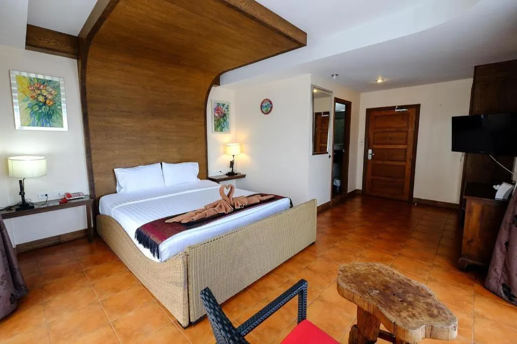 Bed in Red Balcony Hotel