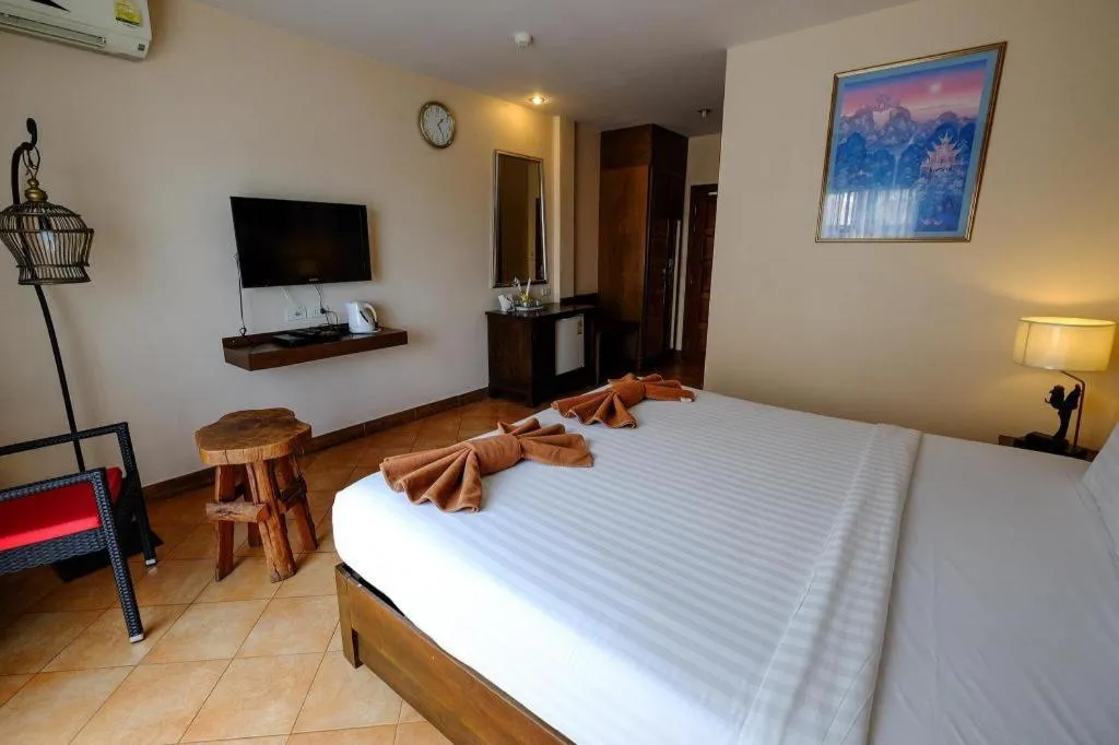 Bed in Red Balcony Hotel