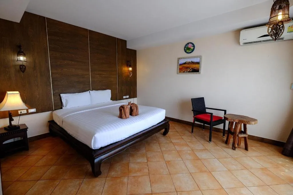 Bed in Red Balcony Hotel