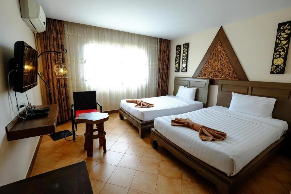 Bed in Red Balcony Hotel