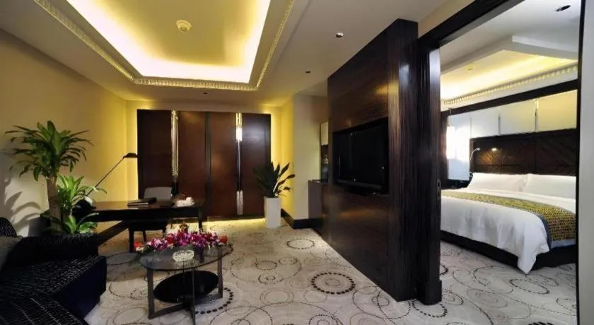 Bed in Grand Soluxe Zhongyou Hotel