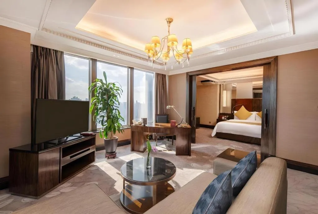 Bed in Grand Soluxe Zhongyou Hotel