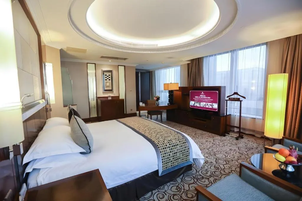 Bed in Grand Soluxe Zhongyou Hotel