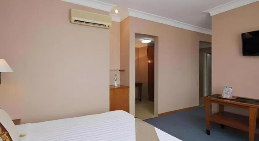 Bed in Nalendra Hotel