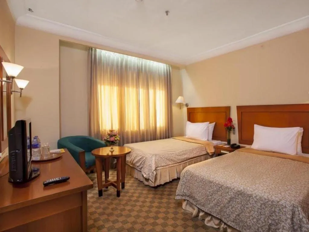 Bed in Nalendra Hotel