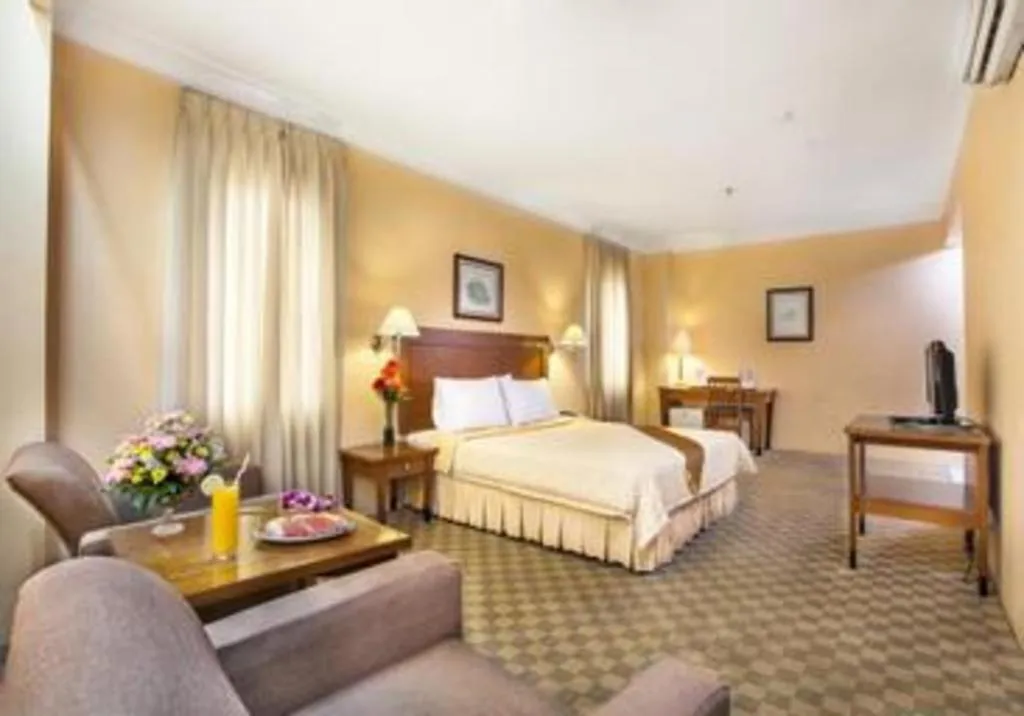 Bed in Nalendra Hotel