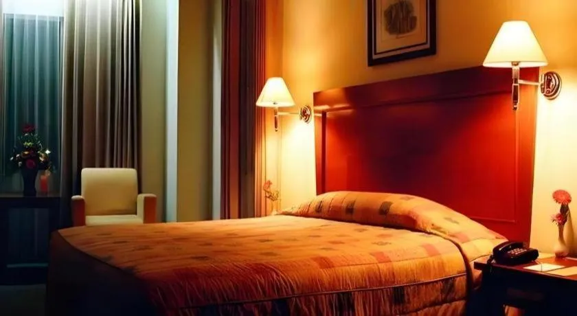 Bed in Nalendra Hotel