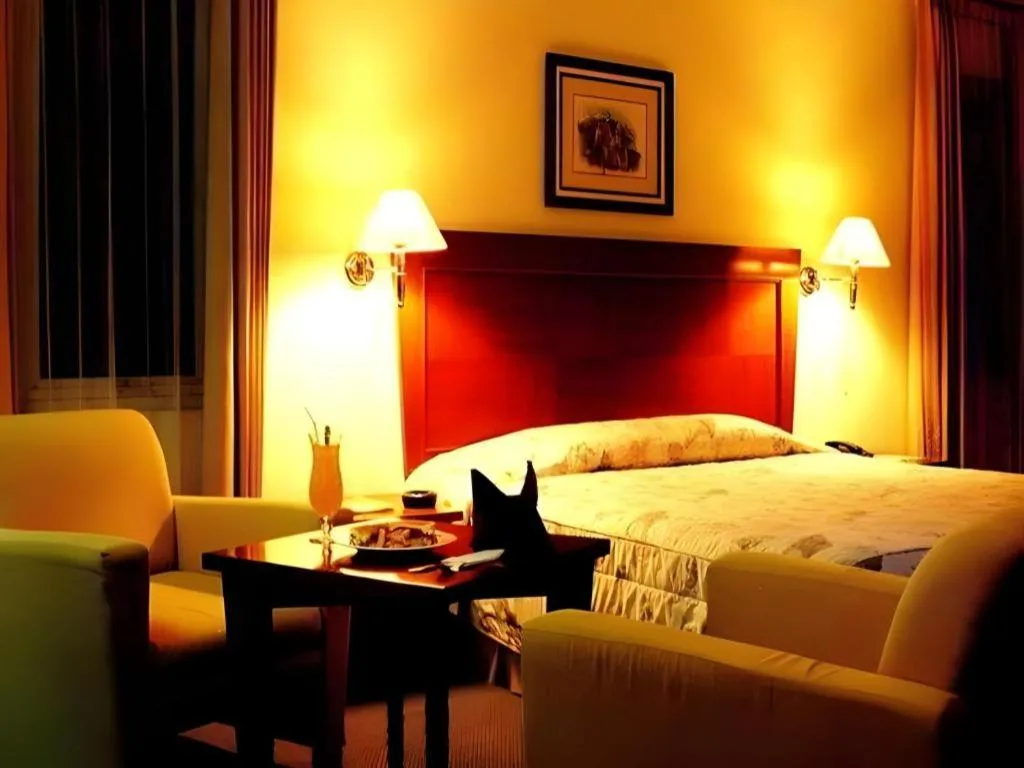 Bed in Nalendra Hotel