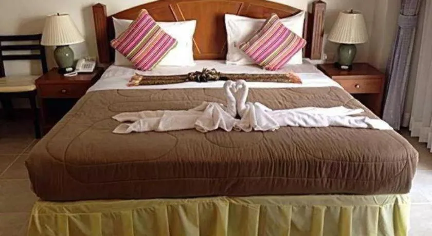 Bed in MT Hotel Patong