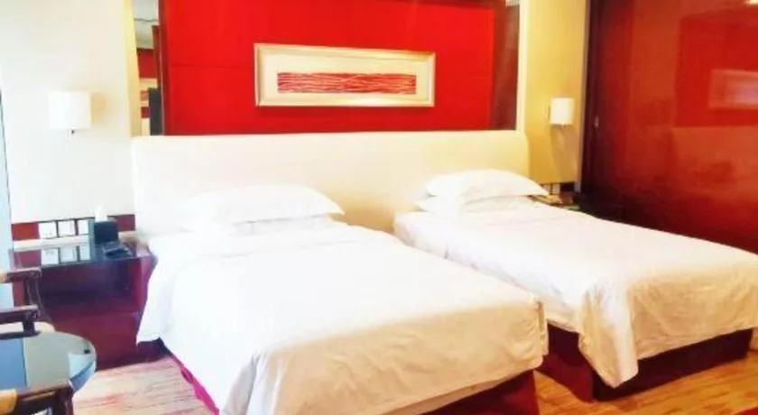 Bed in West International Trade Grand Hotel