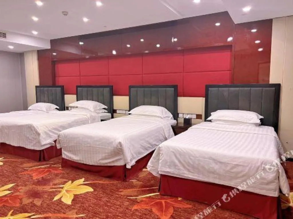 Bed in West International Trade Grand Hotel