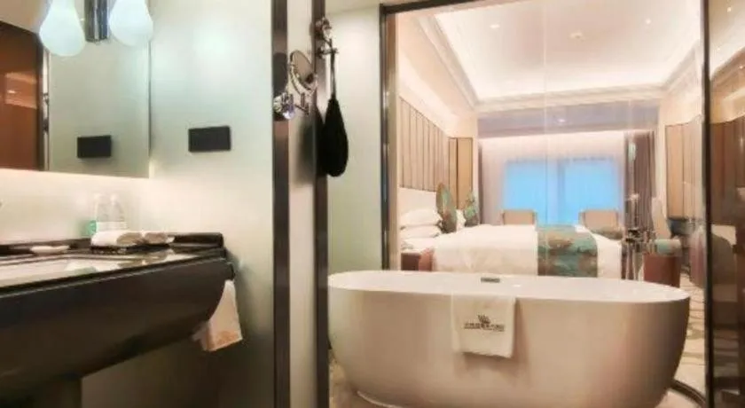 Bed in West International Trade Grand Hotel