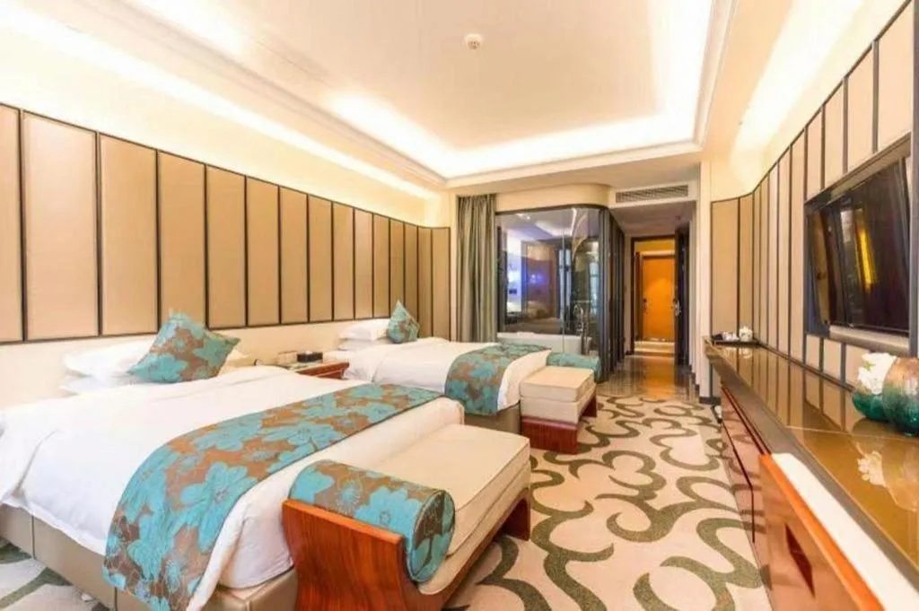 Bed in West International Trade Grand Hotel