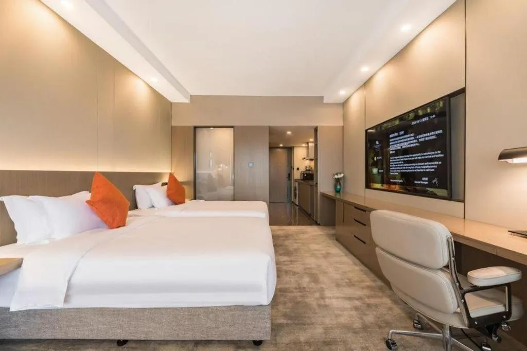 Bed in West International Trade Grand Hotel