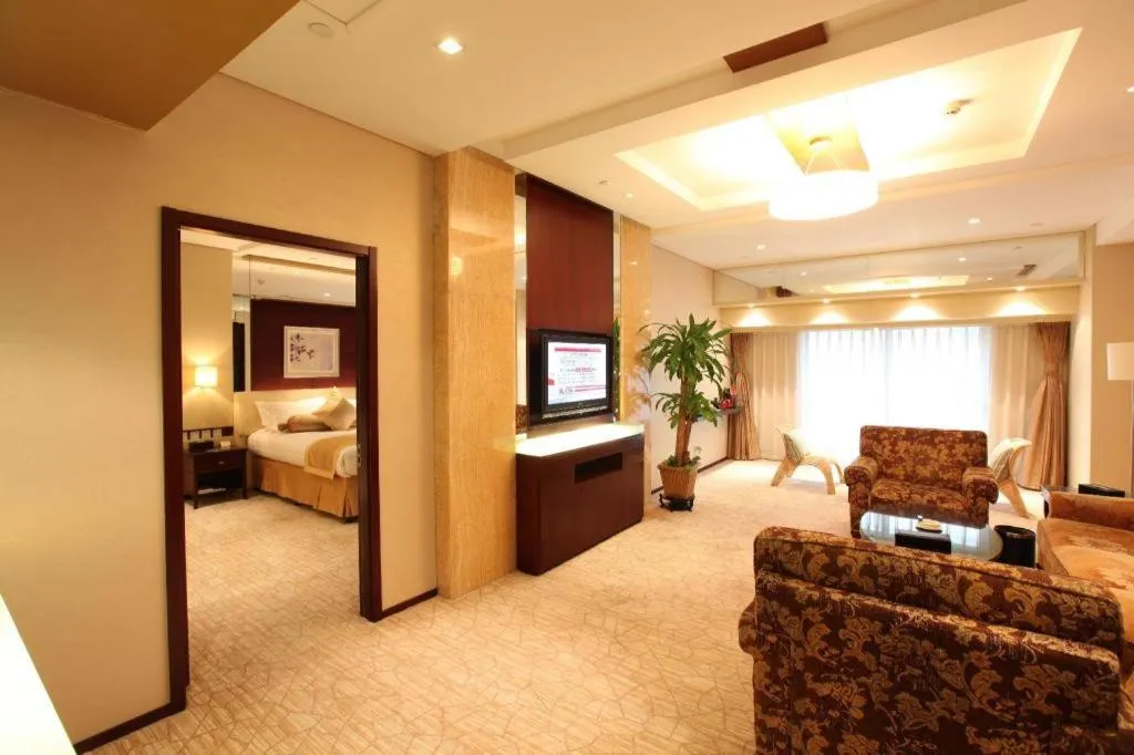 Bed in West International Trade Grand Hotel