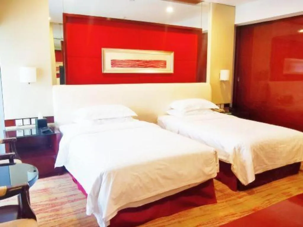 Bed in West International Trade Grand Hotel