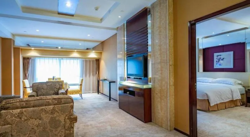 Bed in West International Trade Grand Hotel