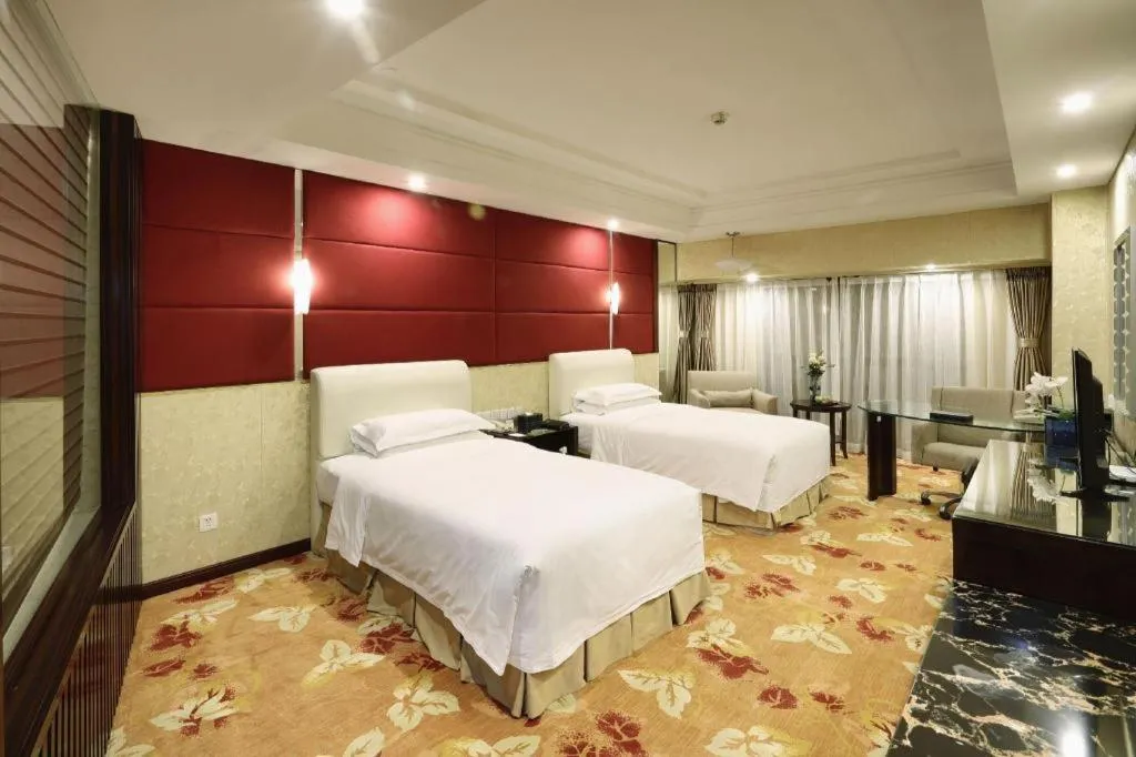 Bed in West International Trade Grand Hotel