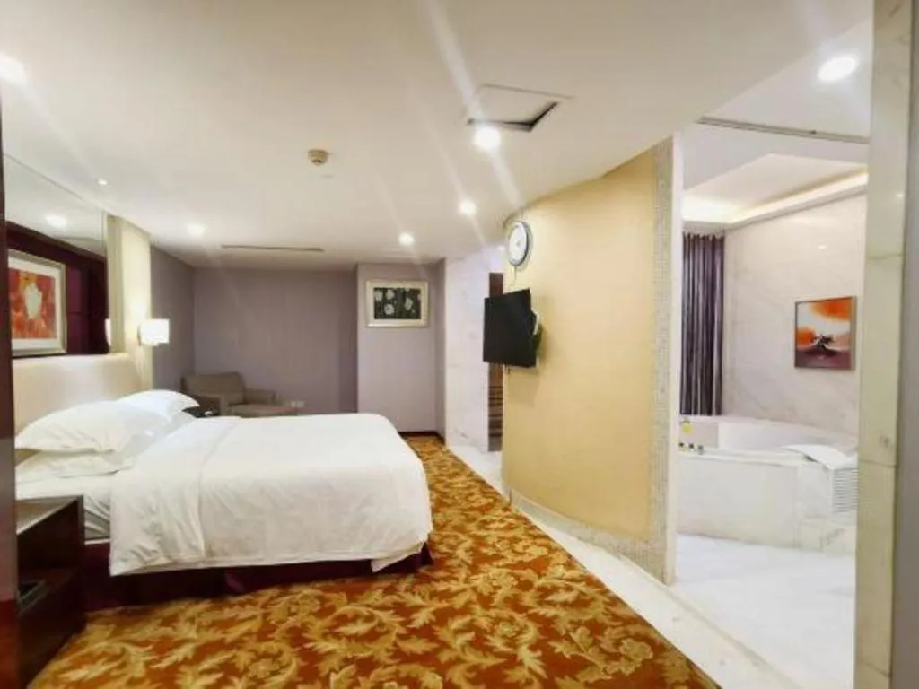 Bed in West International Trade Grand Hotel