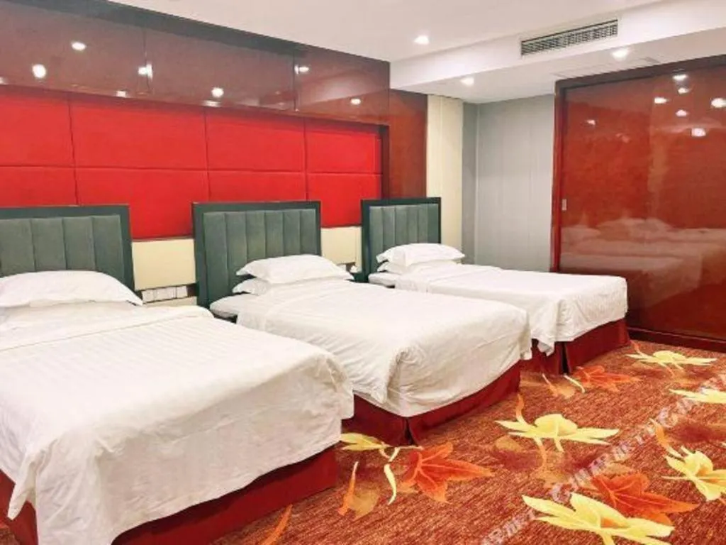 Bed in West International Trade Grand Hotel