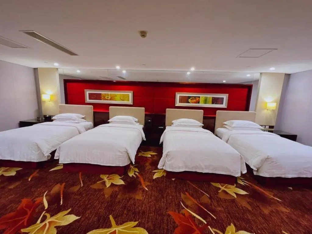 Bed in West International Trade Grand Hotel