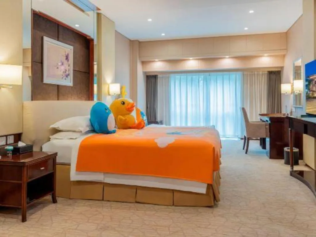 Bed in West International Trade Grand Hotel