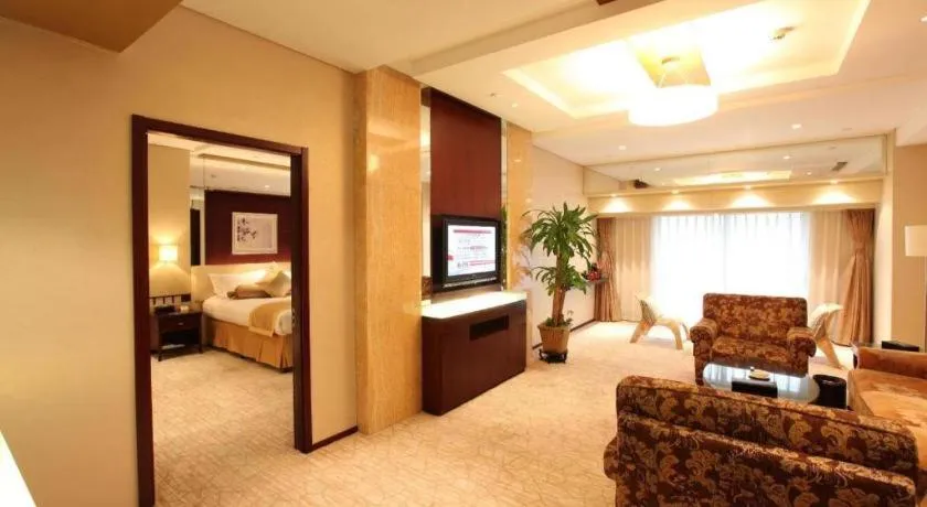 Bed in West International Trade Grand Hotel