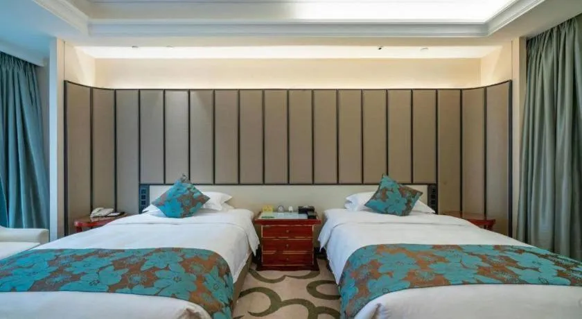 Bed in West International Trade Grand Hotel