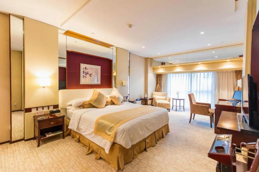 Bed in West International Trade Grand Hotel