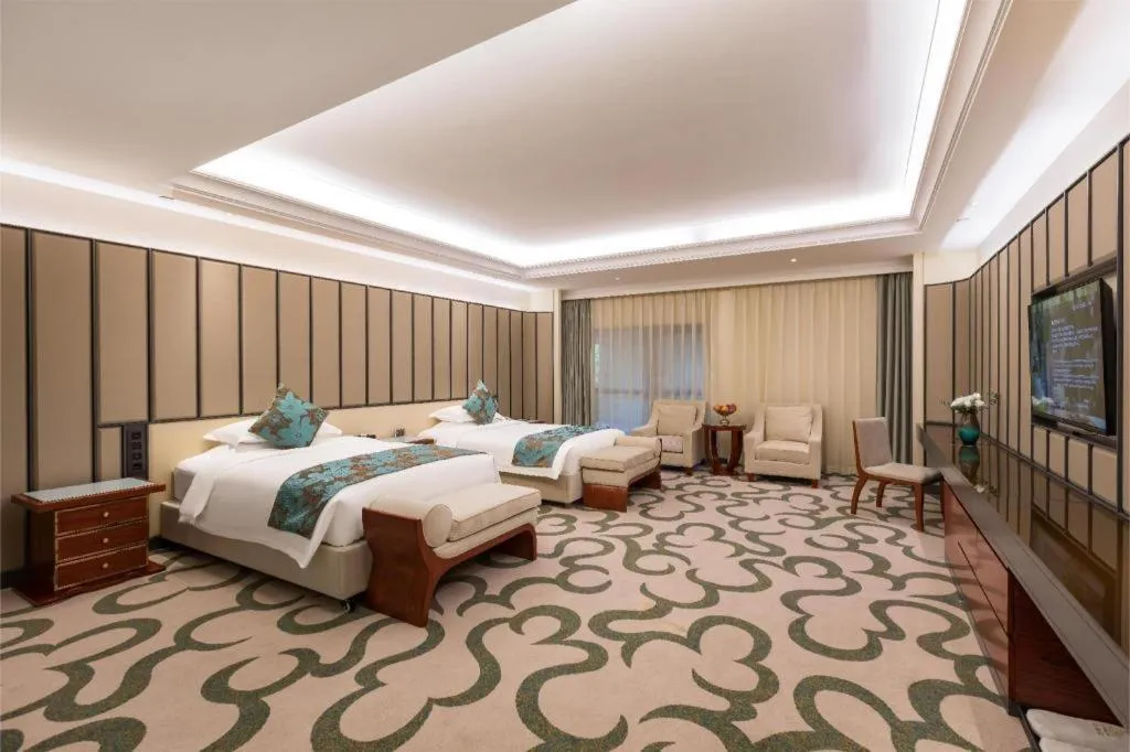 Bed in West International Trade Grand Hotel