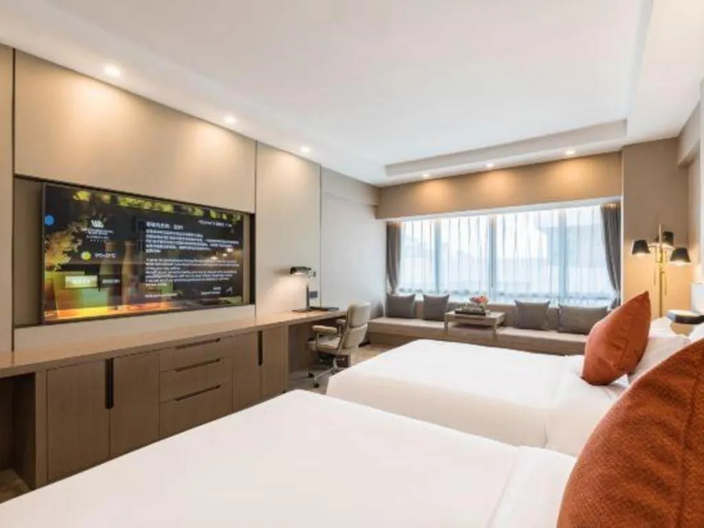 Bed in West International Trade Grand Hotel