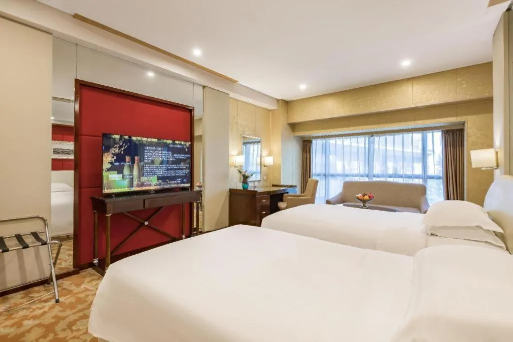 Bed in West International Trade Grand Hotel