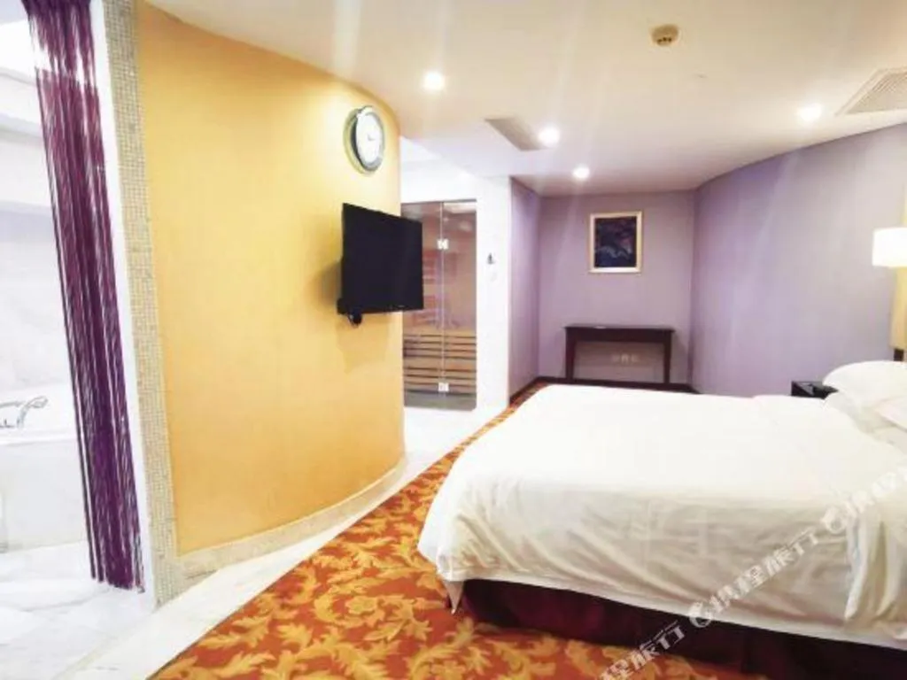 Bed in West International Trade Grand Hotel