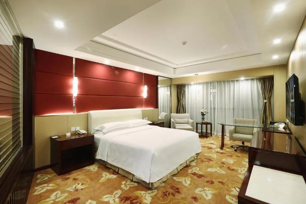 Bed in West International Trade Grand Hotel