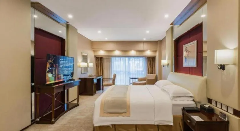 Bed in West International Trade Grand Hotel