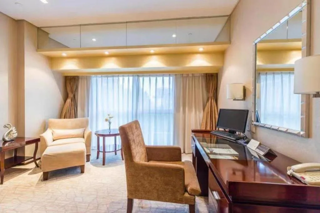 Bed in West International Trade Grand Hotel