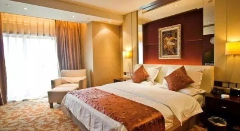 Bed in West International Trade Grand Hotel